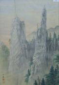 An early 20th century Chinese picture on silk, Mountain Scene, framed and glazed (broken). 41.