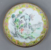 A late 19th/early 20th century Canton yellow ground enamel plate. 27 cm diameter.