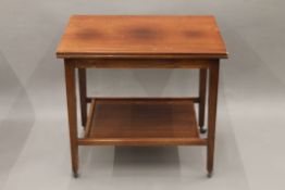 A 20th century mahogany card table. 65.5 cm wide.
