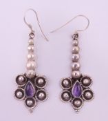 A pair of silver dress earrings. 4.75 cm high.