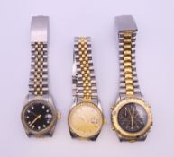 A gentlemen's Accurist wristwatch and two others. The former 4 cm wide.