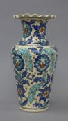 A Persian pottery vase. 28 cm high.