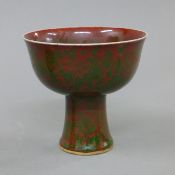 A Chinese porcelain stem cup. 14 cm high.
