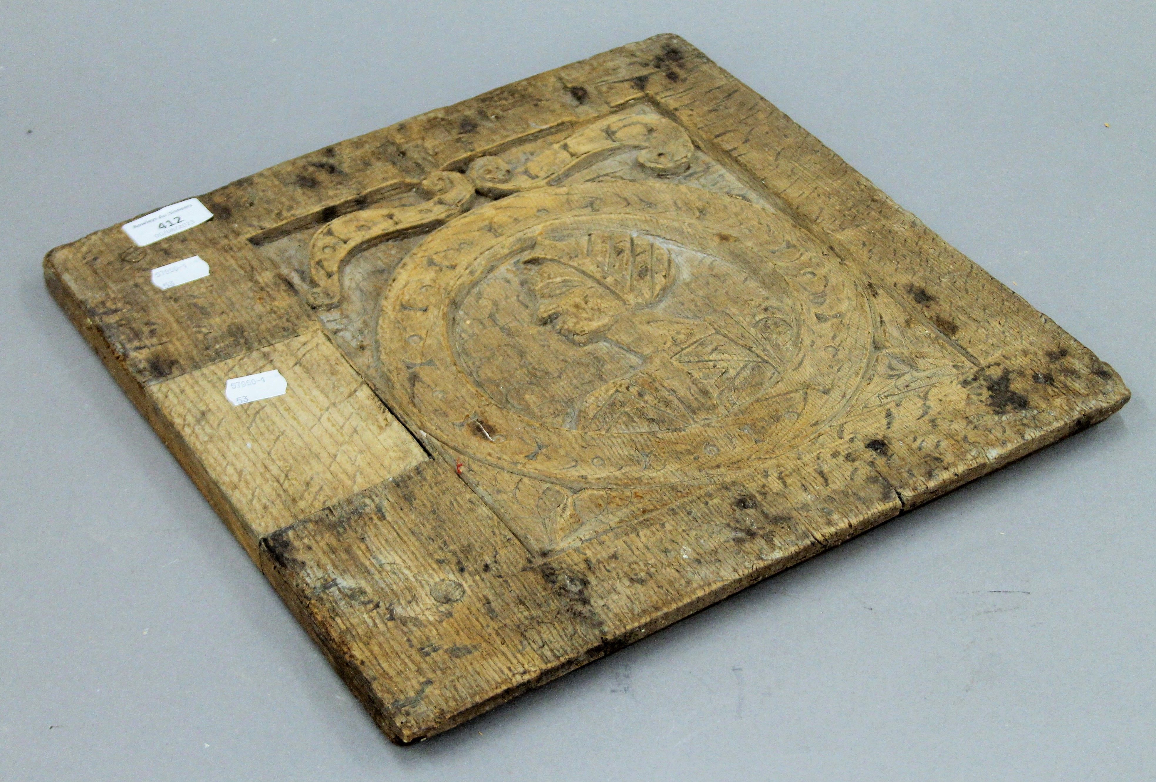 An antique carved oak panel. 35.5 x 35.5 cm. - Image 3 of 3