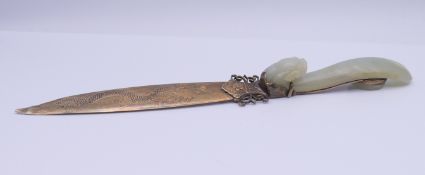 A Chinese jade mounted silver paper knife. 23 cm long.