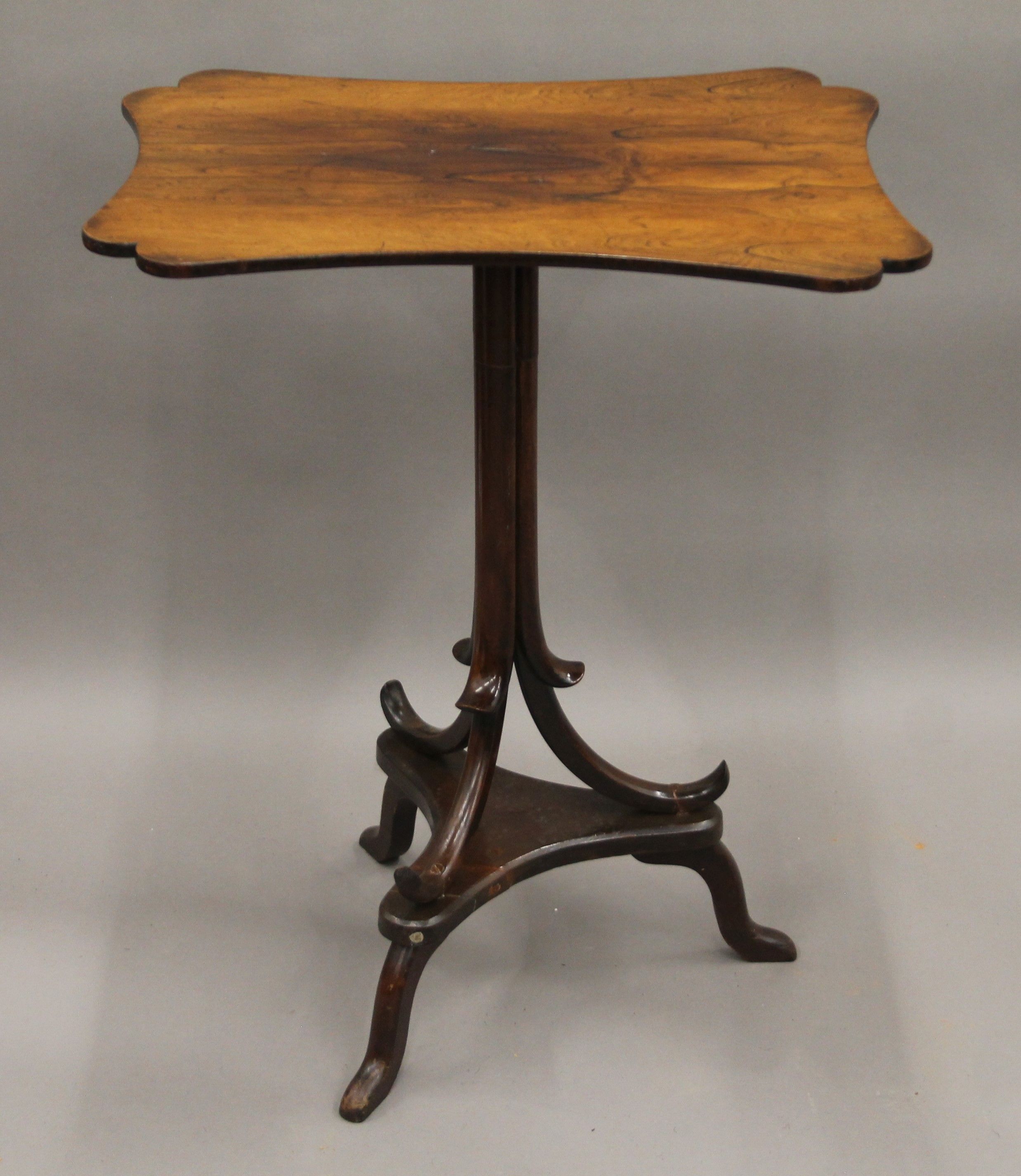 A 19th century rosewood tripod table, the underside stamped for Milles & Edwards, 134 Oxford St,