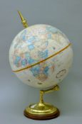 A globe on stand. 52 cm high.