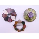 Three Scottish agate brooches. Two 5 cm diameter, the other 4.5 cm diameter.