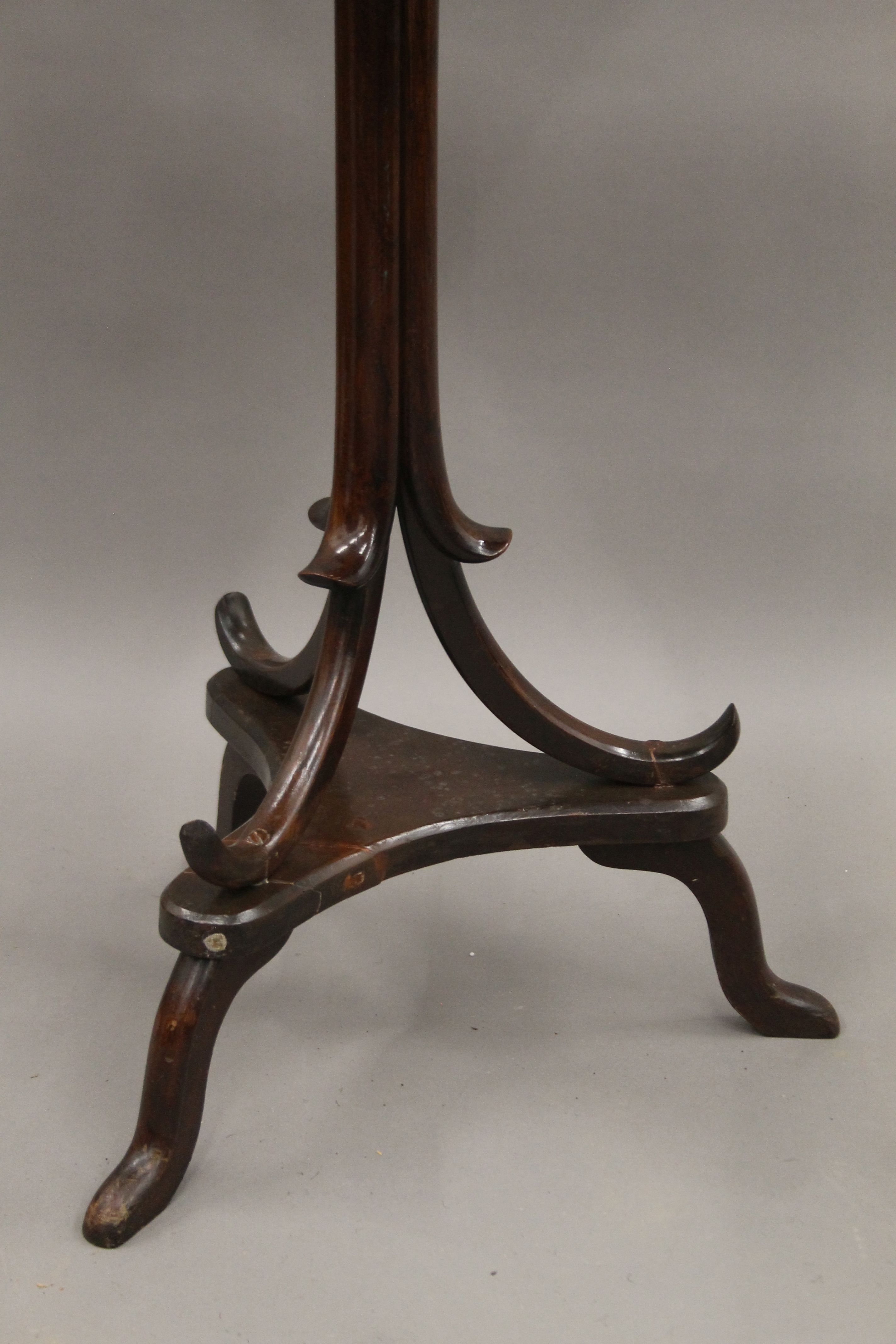 A 19th century rosewood tripod table, the underside stamped for Milles & Edwards, 134 Oxford St, - Image 3 of 10