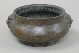 A Chinese silver inlaid bronze censer. 17 cm wide.