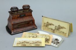 A Victorian birdseye maple stereoscopic viewer, with 20 various cards,