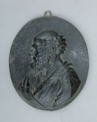 A 19th century cast iron plaque depicting a classical male bust. 15.5 cm high.