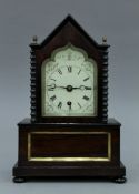 A rosewood cased fusee mantle clock. 28 cm high.