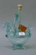 An unusual glass Brandy bottle. 28 cm high.