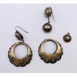 A pair of 19th century gold inlaid tortoiseshell earrings. 5 cm high.