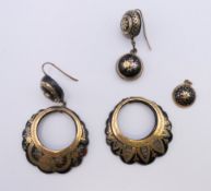 A pair of 19th century gold inlaid tortoiseshell earrings. 5 cm high.