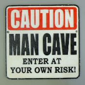 A cast iron Man Cave sign. 24.5 x 24.5 cm.