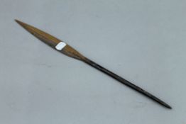 A tribal spear head. 43 cm long.