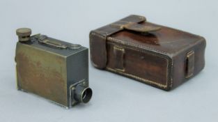 A leather cased Troughton & Simms of London WWI military issue angle of sight instrument (MK1)