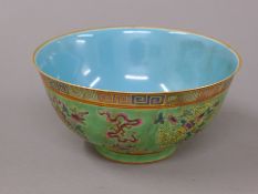 A Chinese green ground porcelain bowl. 16.5 cm diameter.