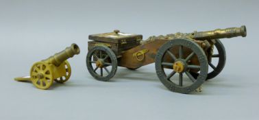 Two model cannons. The largest 34.5 cm long.