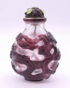 A Chinese cameo glass snuff bottle. 7 cm high.