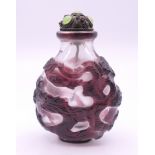 A Chinese cameo glass snuff bottle. 7 cm high.