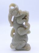 A jade dog of fo figure. 8.5 cm high.