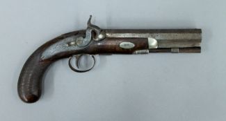 A 19th century percussion pistol. 28.5 cm long.