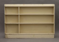 A large white painted bookcase. 157 cm long, 105.5 cm high, 19 cm deep.
