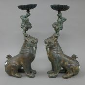 A pair of bronze fo dog pricket sticks. 45 cm high.
