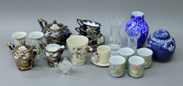 A quantity of decorative porcelain and glass, including a Japanese tea set.