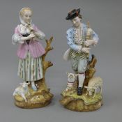 A pair of large porcelain figures of a shepherd and shepherdess. Each approximately 45 cm high.
