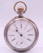 An 800 silver open face pocket watch, the case with German Export mark. 4.5 cm diameter.