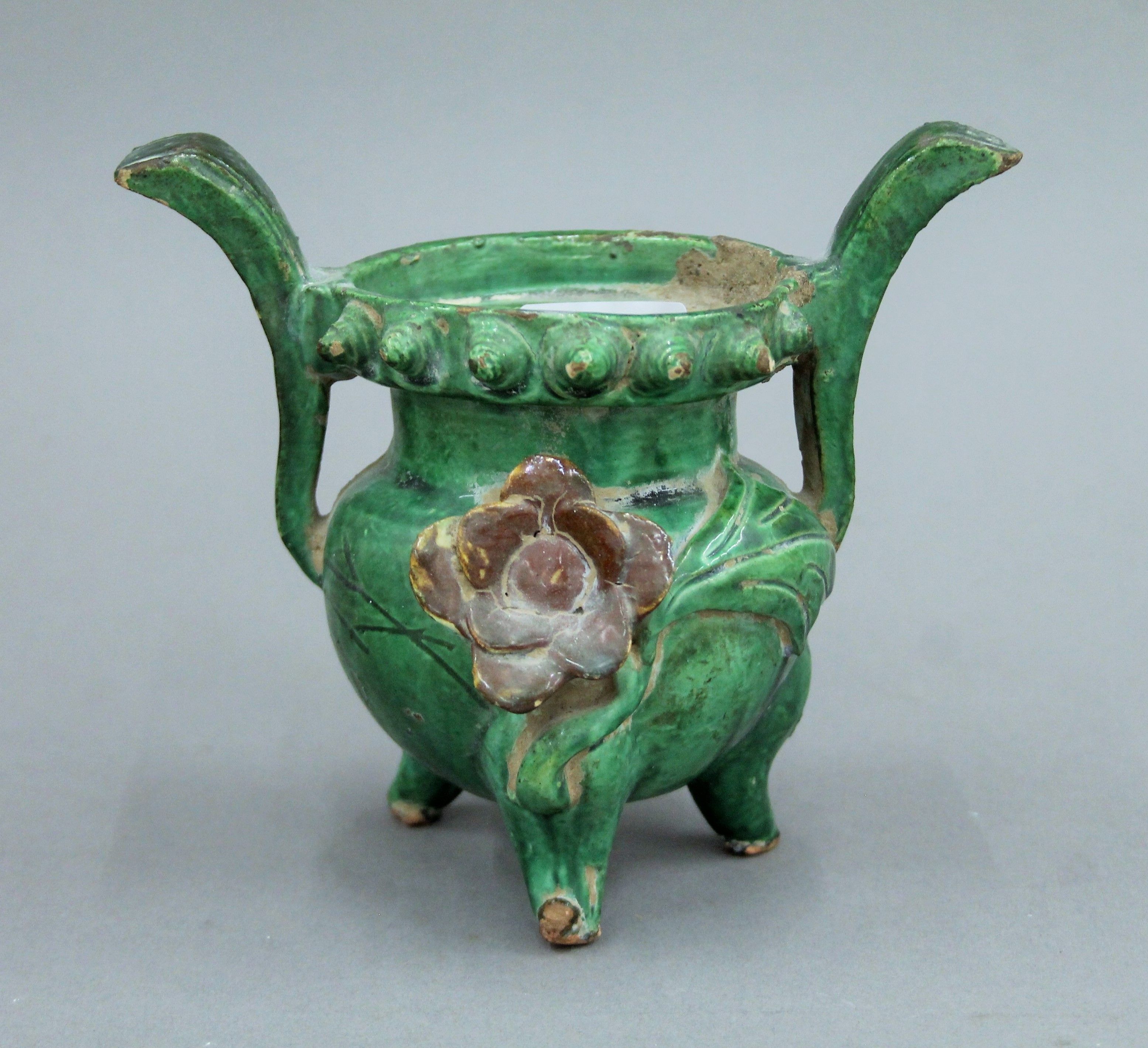 A Chinese green and brown glazed pottery censer. 14.5 cm high.