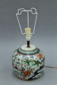 An 18th/19th century Chinese porcelain ginger jar form lamp. 44 cm high overall.
