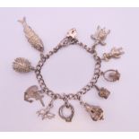 A silver charm bracelet. 41.5 grammes total weight.
