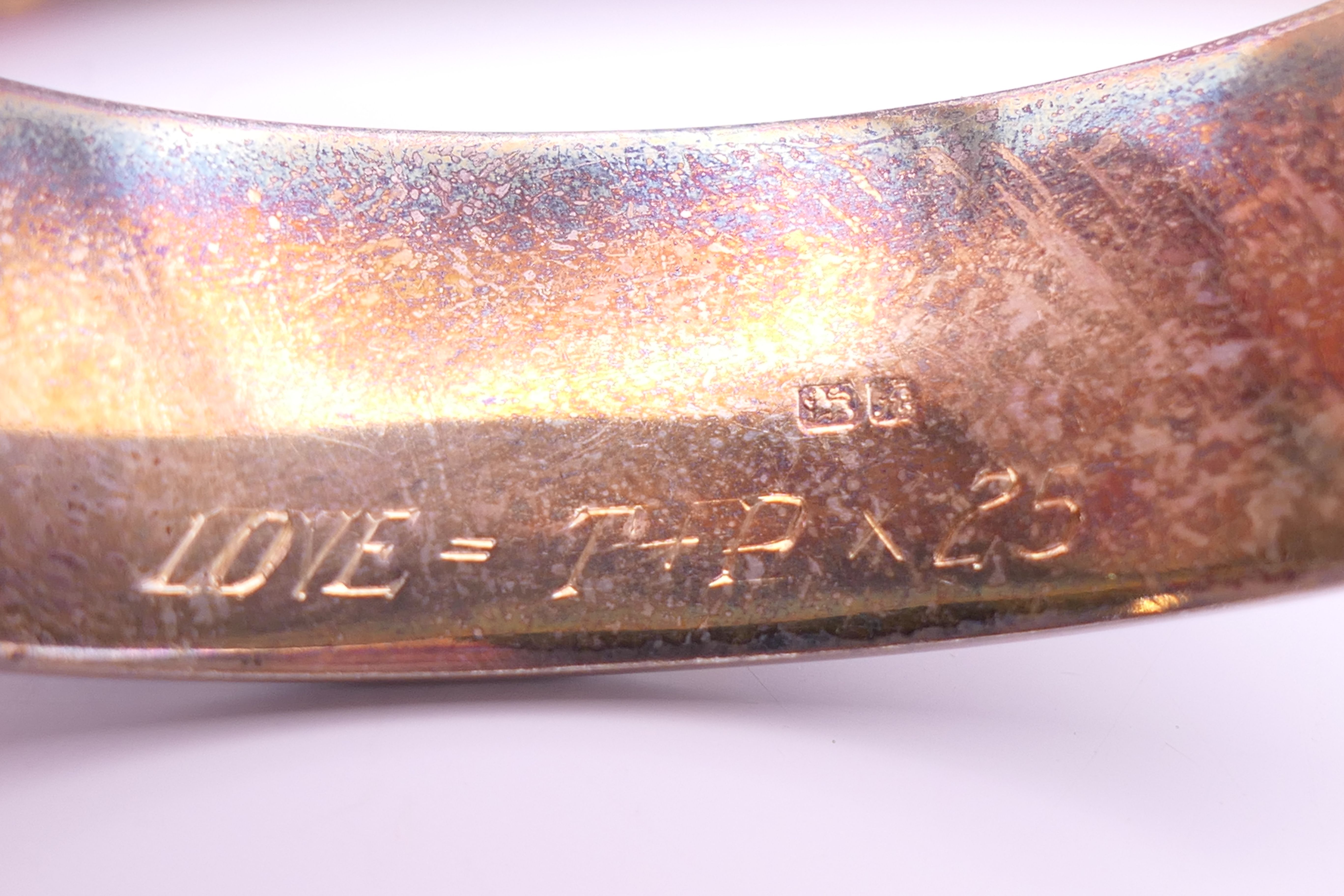 Two silver bangle formed bracelets. The largest 6.5 cm wide. 58.7 grammes. - Image 4 of 13