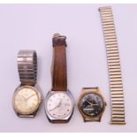 Three gentlemen's wristwatches - Ingersoll, Revelex and Oris. The former 3.25 cm wide.