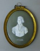 A 19th century Jasper Ware plaque depicting Nelson, housed in a brass frame. 13 cm high.