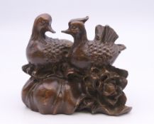 A bronze model of mandarin ducks. 5.5 cm wide.