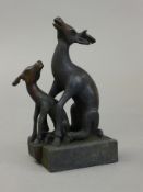 A double bronze seal formed as deer. 12 cm high.