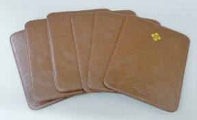 Six Patek Philippe place mats. 19.5 x 23 cm.