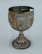 A 19th century Eastern copper goblet decorated with various animals. 13 cm high.