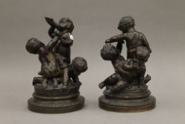 A pair of 19th century bronze sculptures of putti. Each approximately 28 cm high.