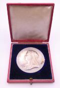 A cased 1837-1897 Queen Victoria Jubilee medallion.