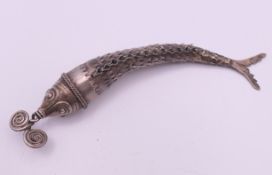 An articulated unmarked white metal fish form scent bottle. 12 cm long.