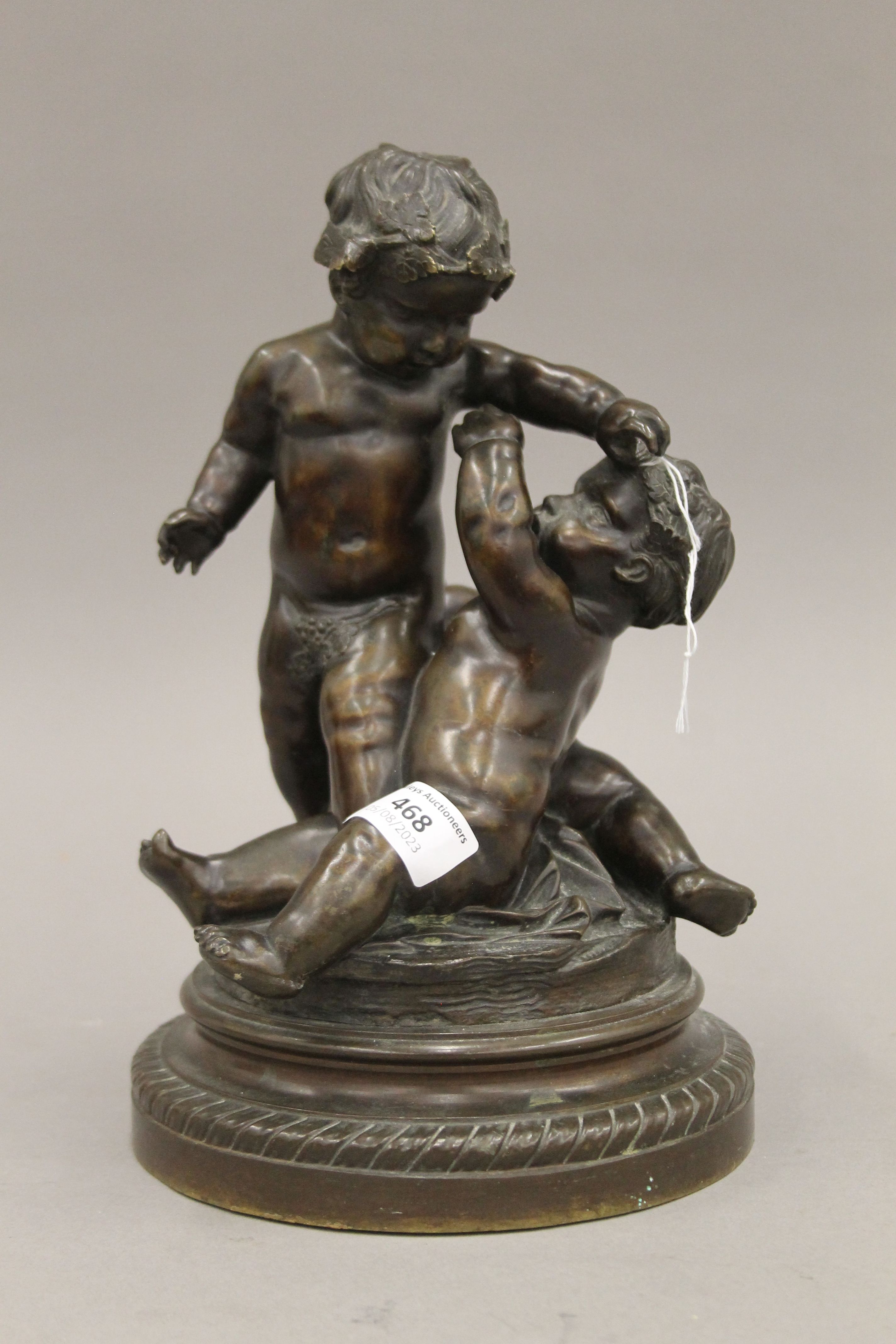 A pair of 19th century bronze sculptures of putti. Each approximately 28 cm high. - Image 5 of 5