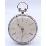 A silver cased open face pocket watch. 5 cm diameter.