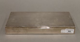 A large silver cigarette box. 30 cm wide.